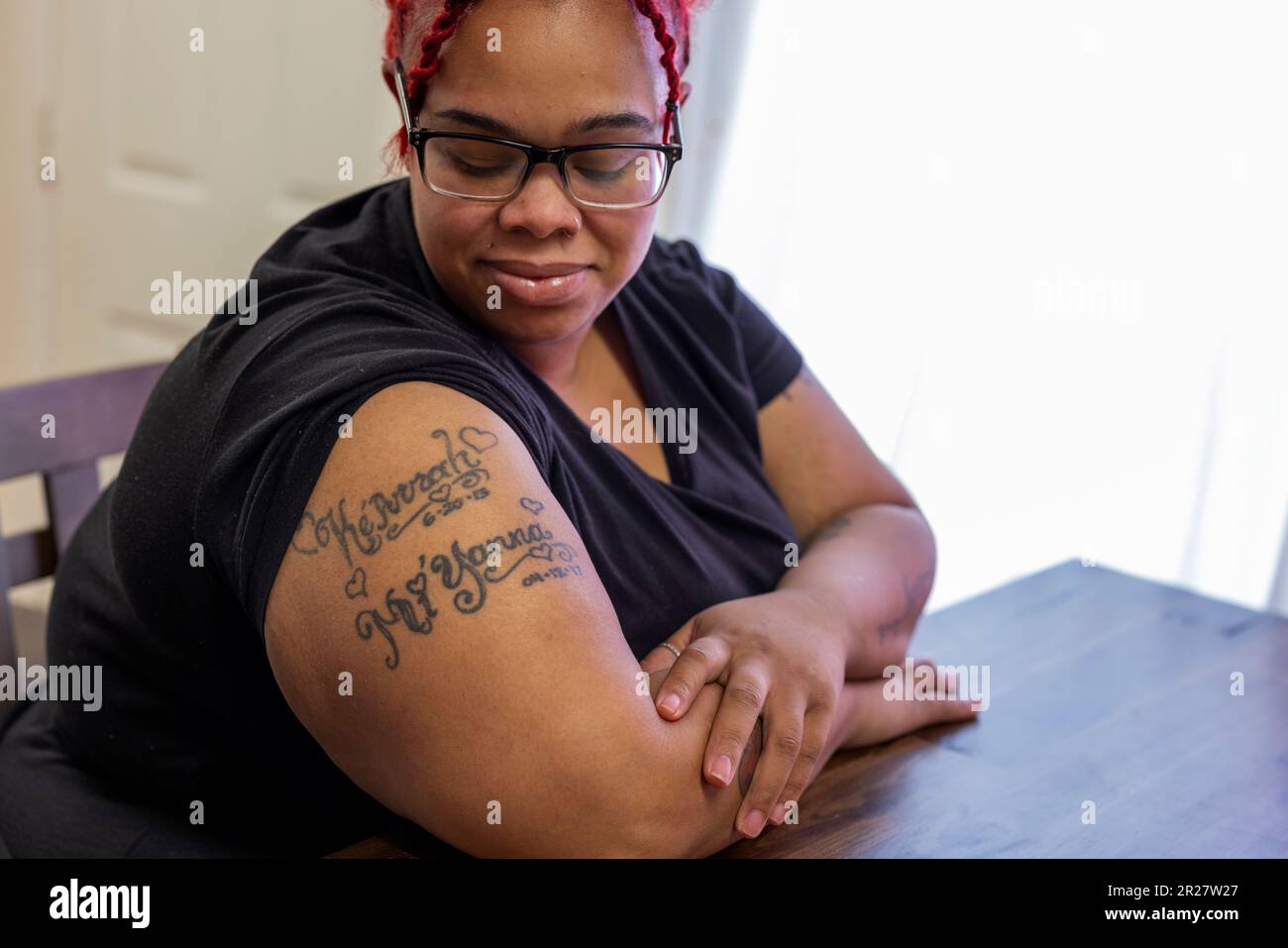 Ashely Martin shows a tattoo of her daughters names at home Monday April  3 2023 in Niagara Falls NY AP PhotoLauren Petracca Stock Photo   Alamy