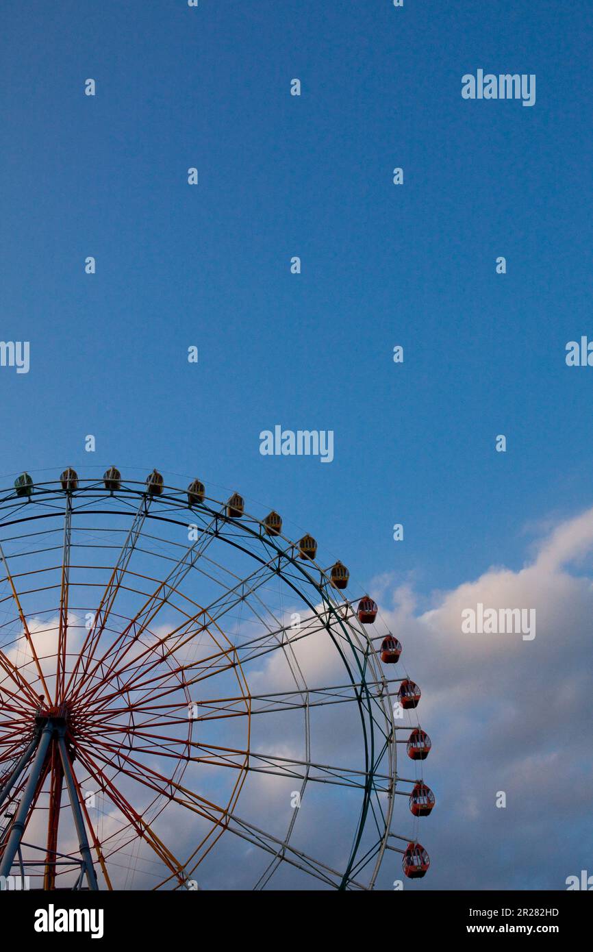 Ferris wheel and clouds Stock Photo - Alamy