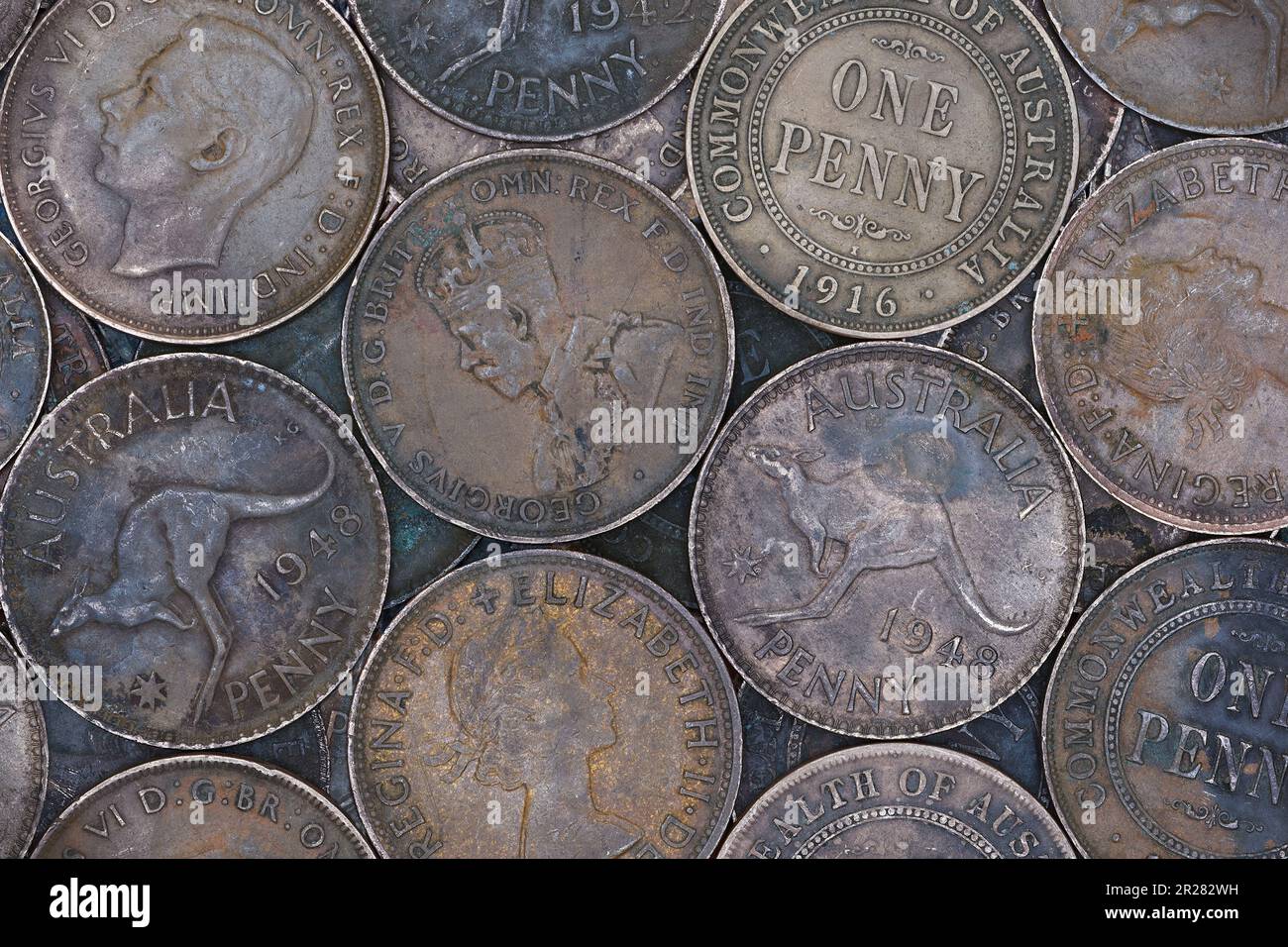 A flat, top view montage of bronze, old Australian penny coins filling