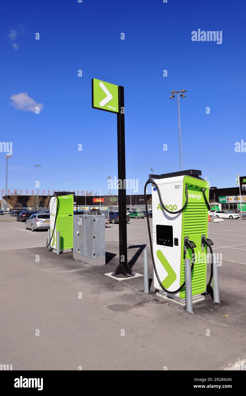 Sodertalje, Sweden - May 6, 2023: Two Allego electrical cars charching ports at Wasa shopping center. Stock Photo