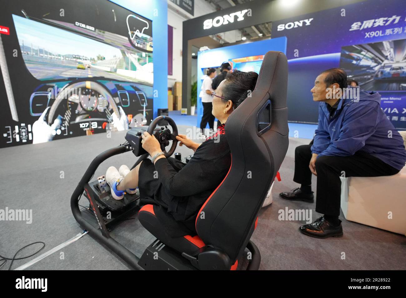 QINGDAO, CHINA MAY 17, 2023 Visitors experience driving simulation