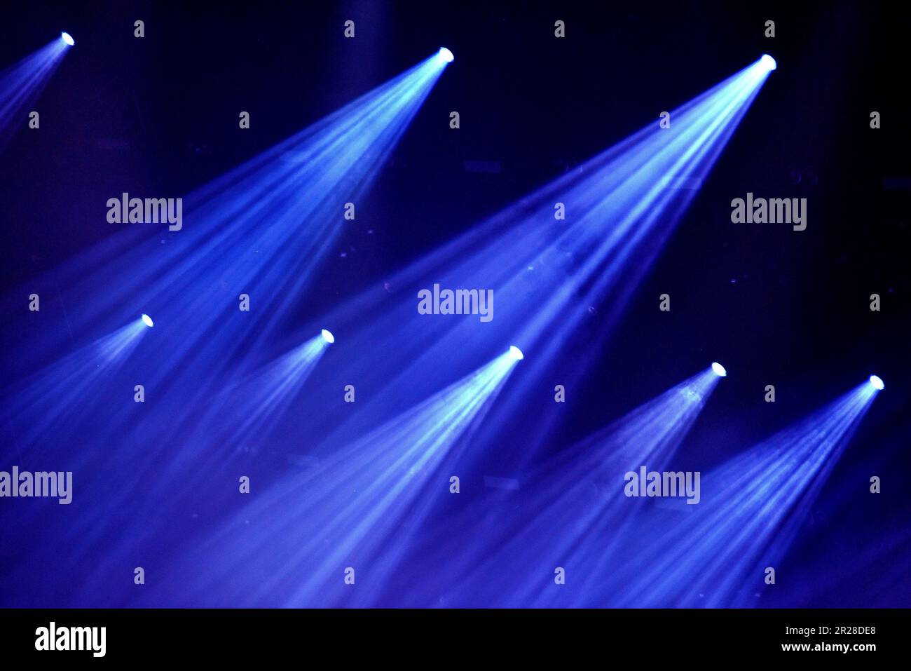 Stage lights glowing at live concert background Stock Photo