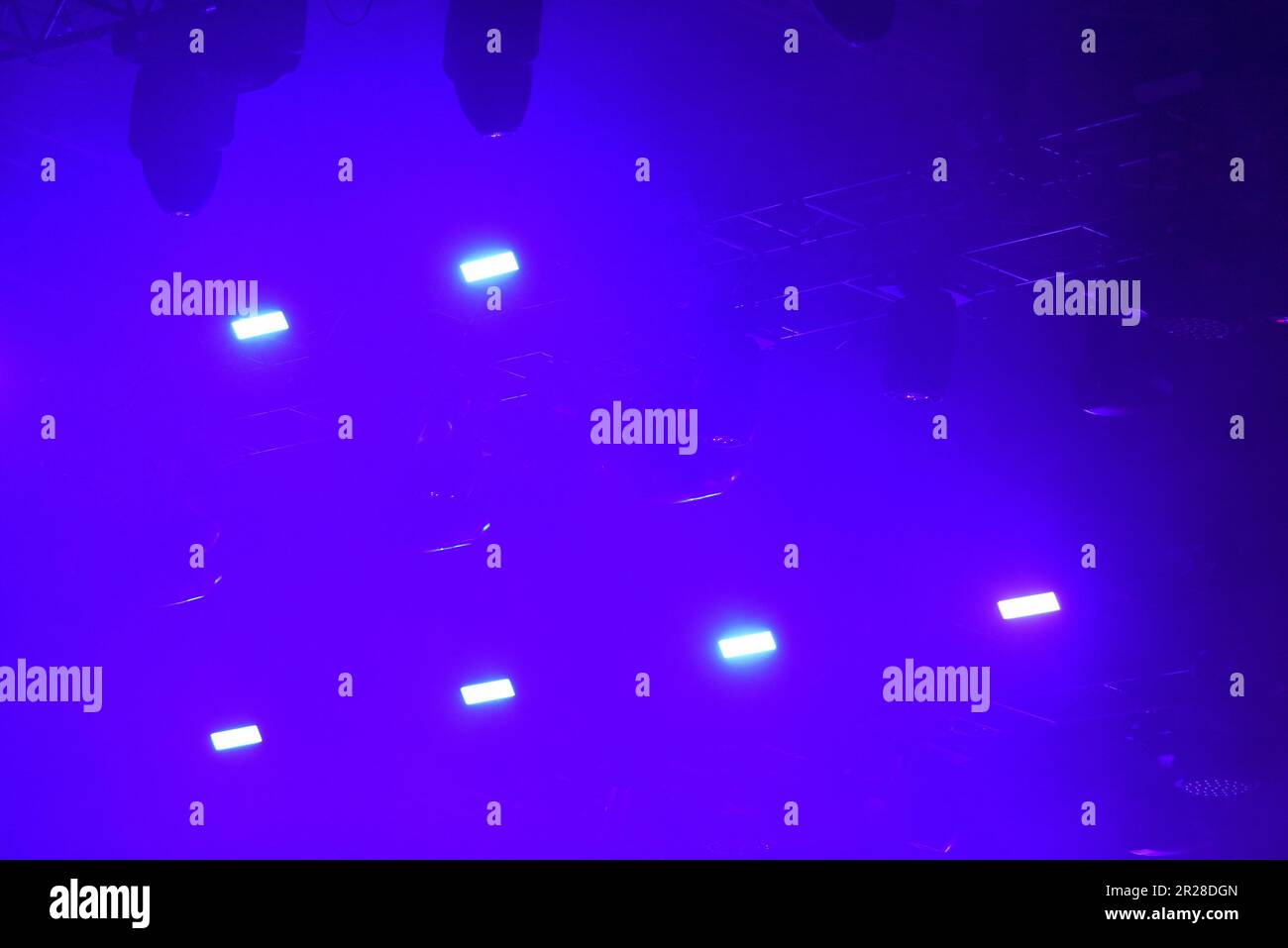 Background of stage lights glowing at live concert Stock Photo