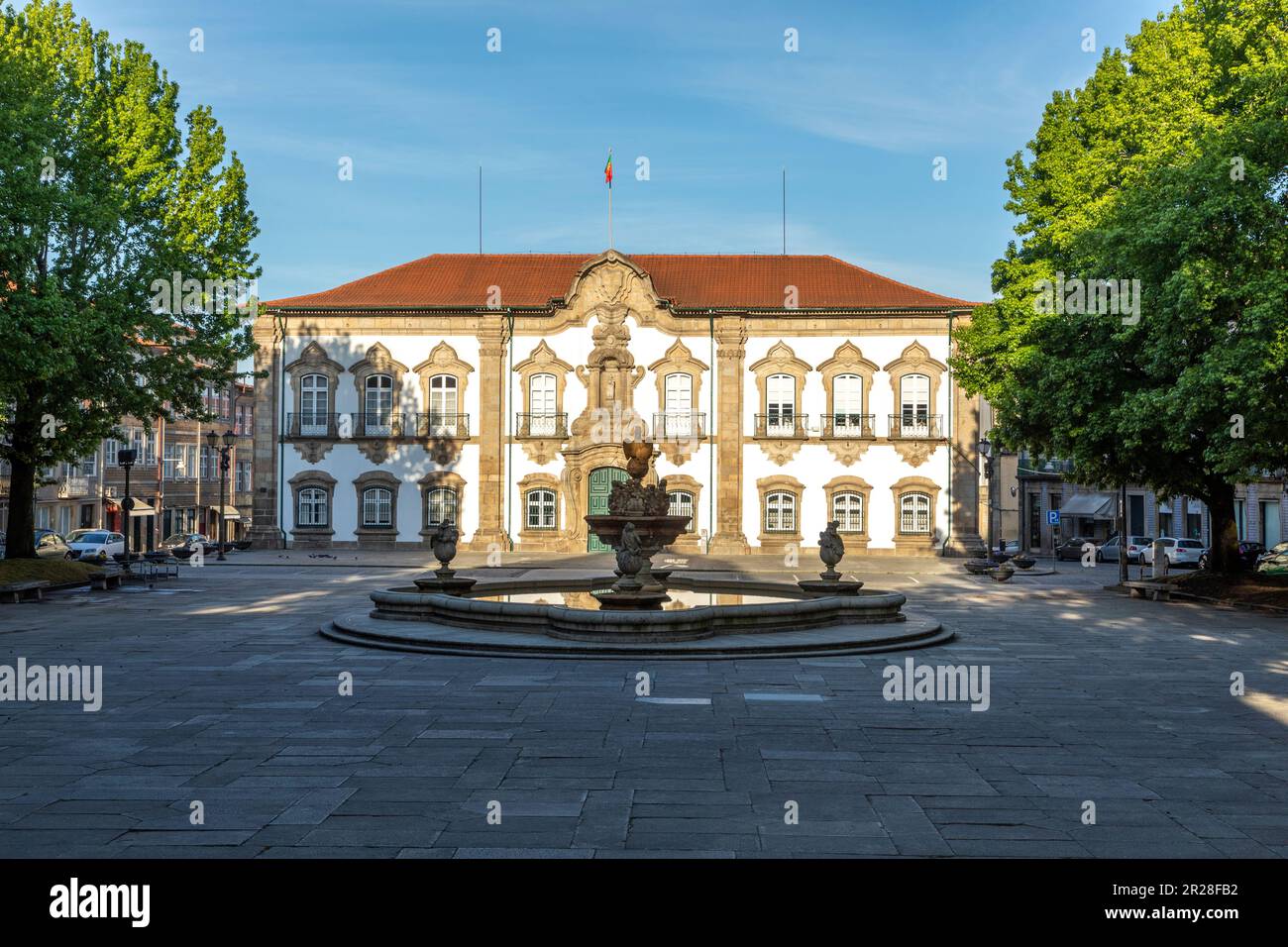 Braga City Hall - Paços do Concelho - and Pelican Fountain - Braga, Portugal in sunrise light Stock Photo