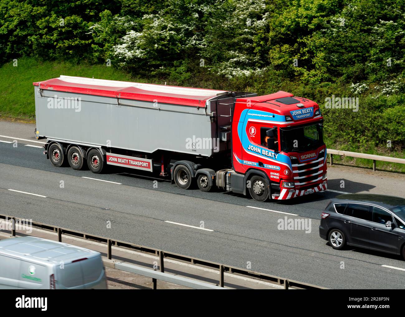 John Beaty lorry on the M40 motorway, Warwickshire, UK Stock Photo