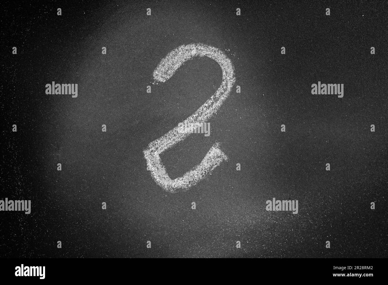 Number two handwritten with chalk on a black blackboard Stock Photo - Alamy