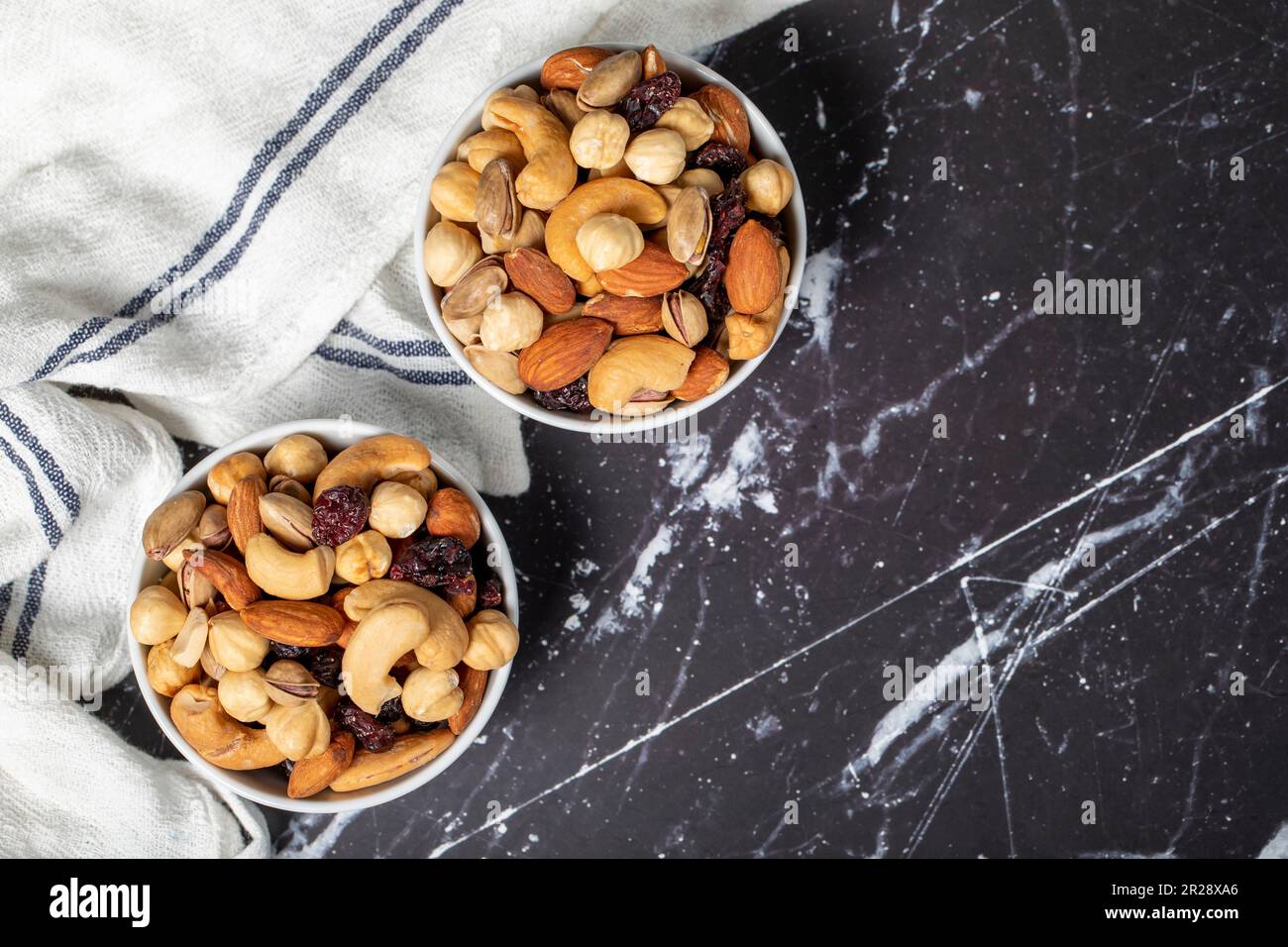 Mixed nuts. Special mixed nuts in a ceramic bowl. Nuts, pistachios, peanuts, cashews, almonds