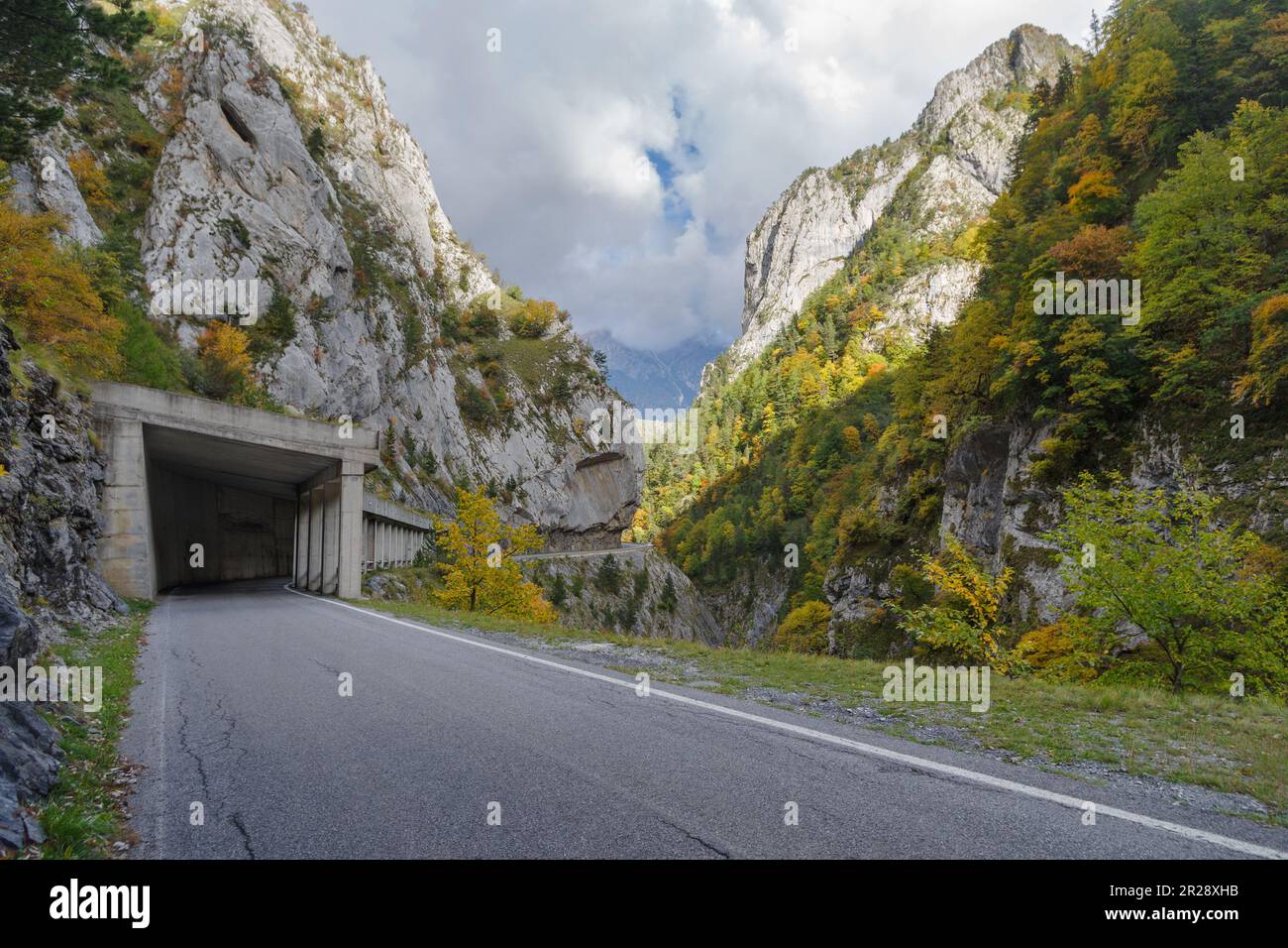 Winding road and tunnel in mountains hi-res stock photography and ...