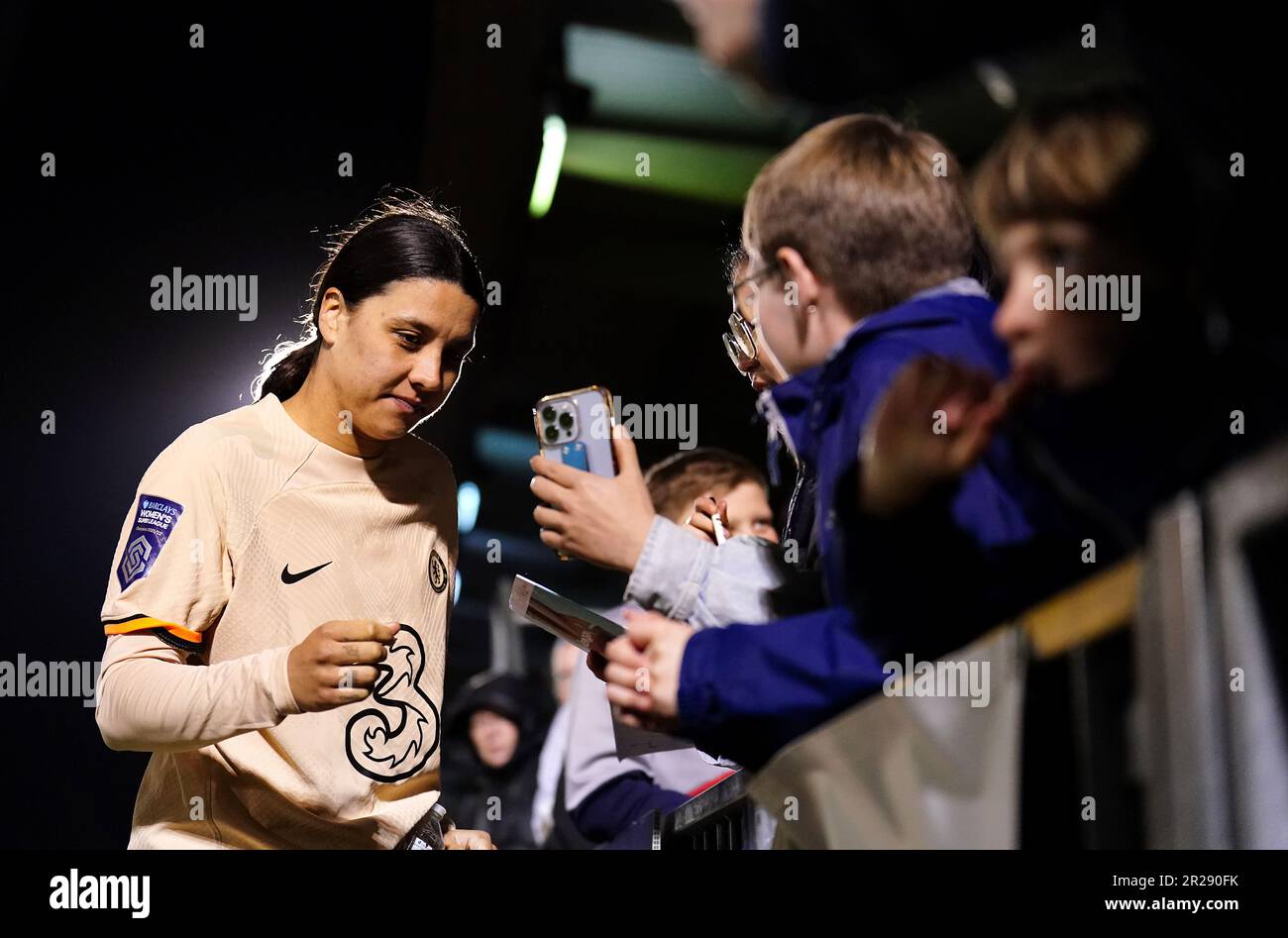 Chelsea’s Sam Kerr with fans after the Barclays Women's Super League match at Chigwell Construction Stadium, London Stock Photo