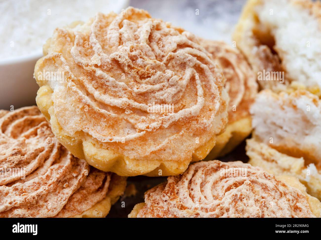 traditional South African Hertzog cookies, coconut and jam tartlets Stock Photo