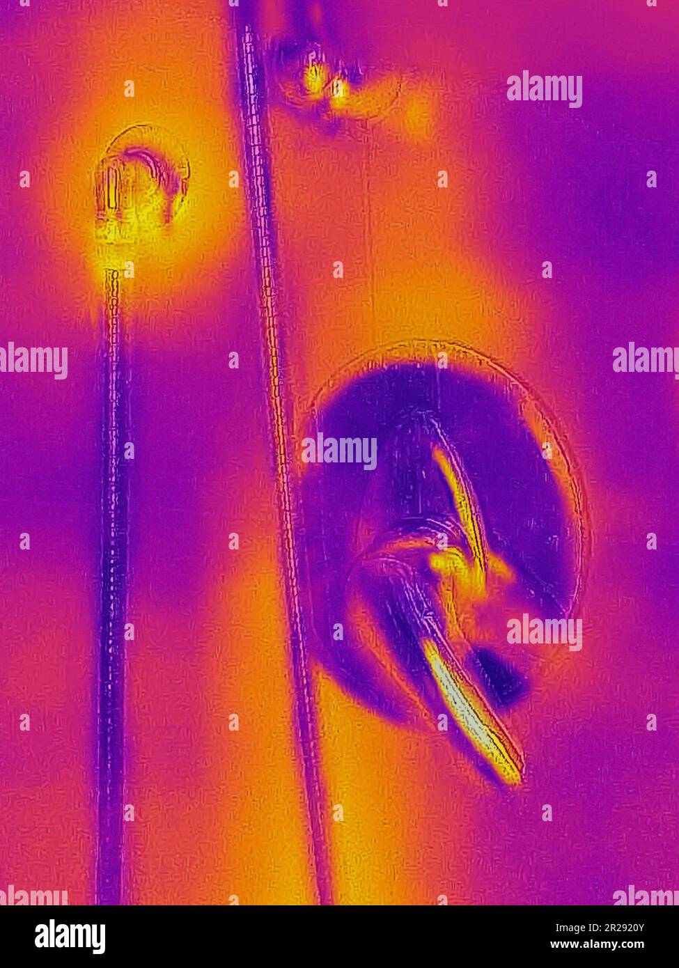 A thermal image of a shower faucet captured with an infrared thermal