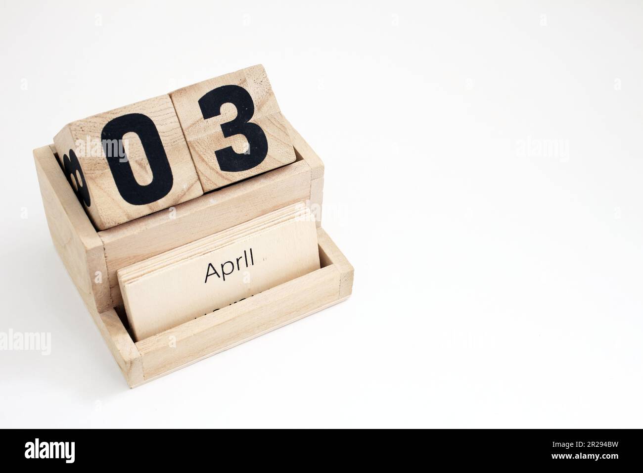 Wooden perpetual calendar showing the 3rd of April Stock Photo - Alamy