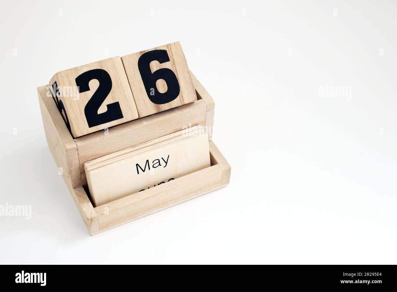 Wooden perpetual calendar showing the 26th of May Stock Photo - Alamy