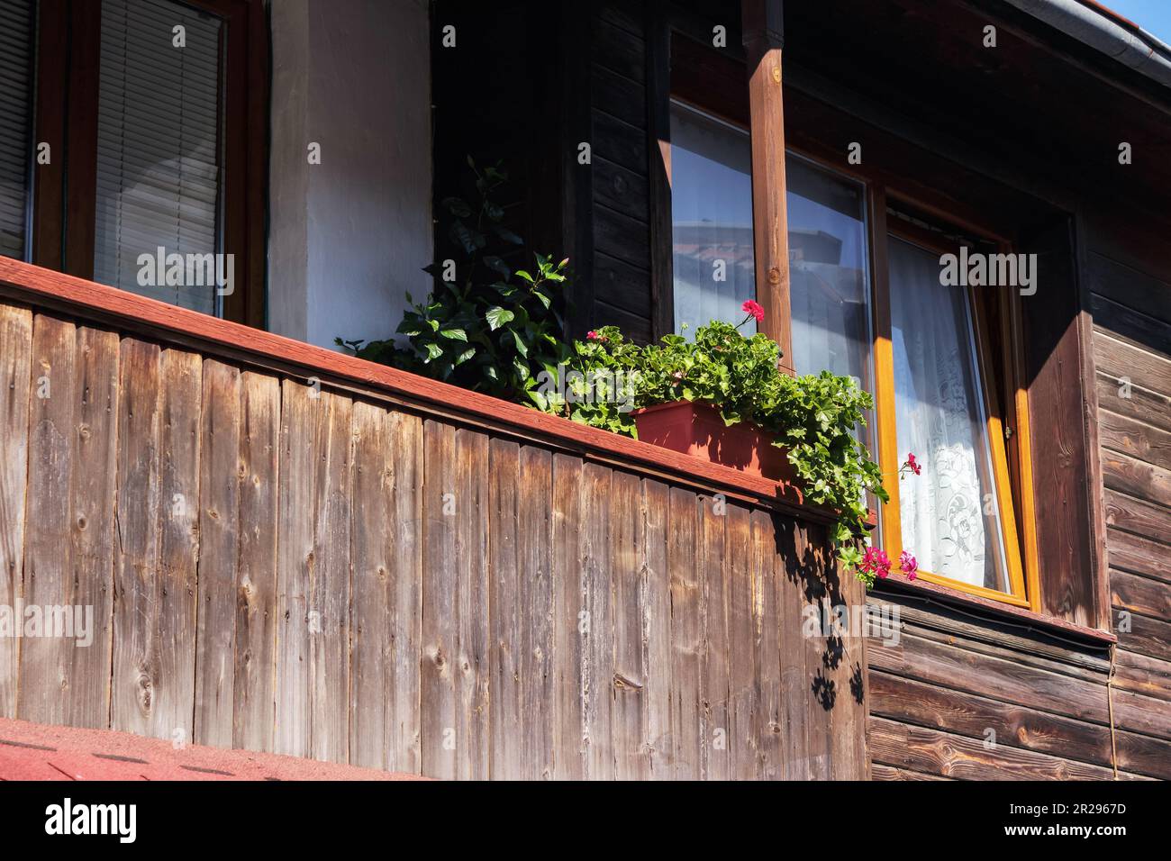 windows on the vintage wooden wall. ancient architecture Stock Photo