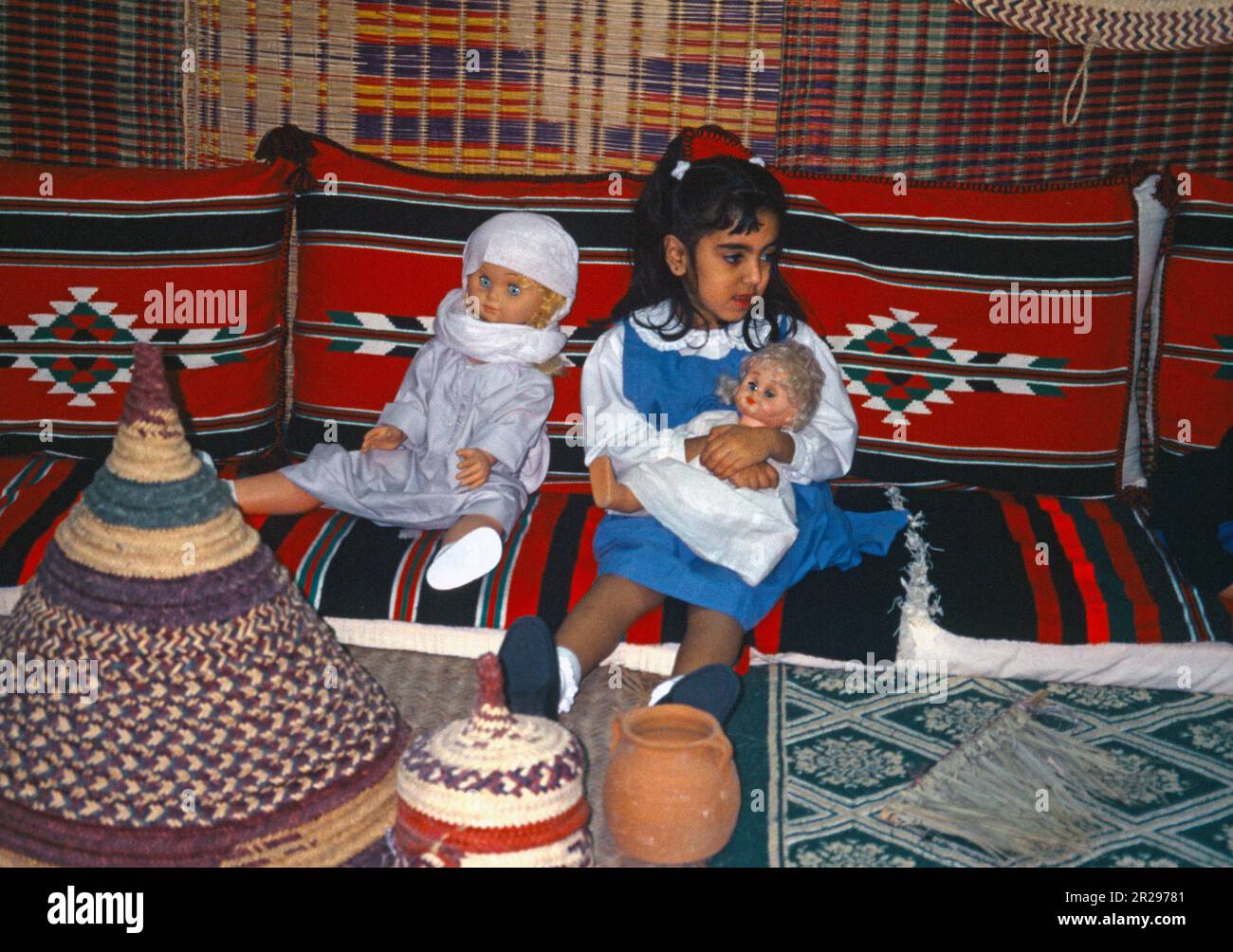 Abu Dhabi UAE Kindergarten Girl Wearing School Uniform Holding Doll