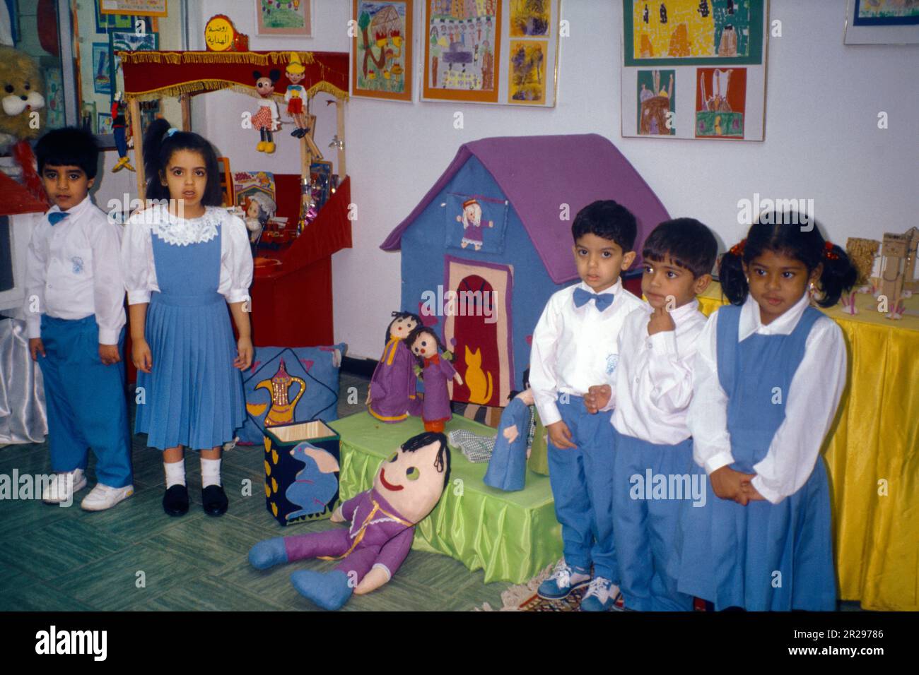 Abu Dhabi UAE Kindergarten Mixed Childrens Class Boy And Girl In School Uniform by Toys Stock Photo