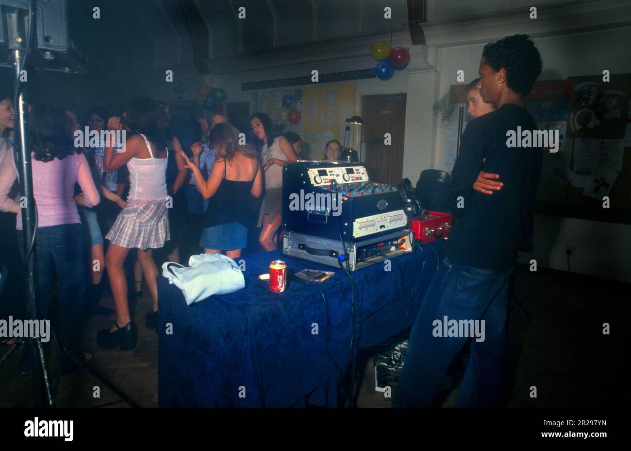 Teenagers Dancing At Disco for 13th Birthday Party Surrey England Stock