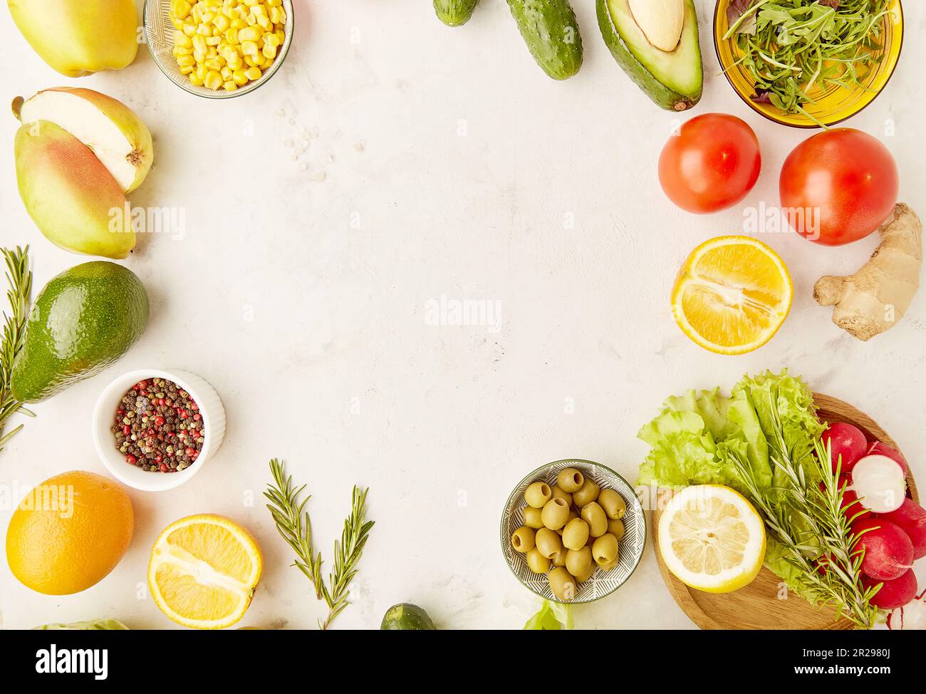 Low carb, FODMAP, Mediterranean, KETO, plant based diet food. Fruits, vegetables, greens, citrus, olives with copy space in the centre. Detox, healthy Stock Photo