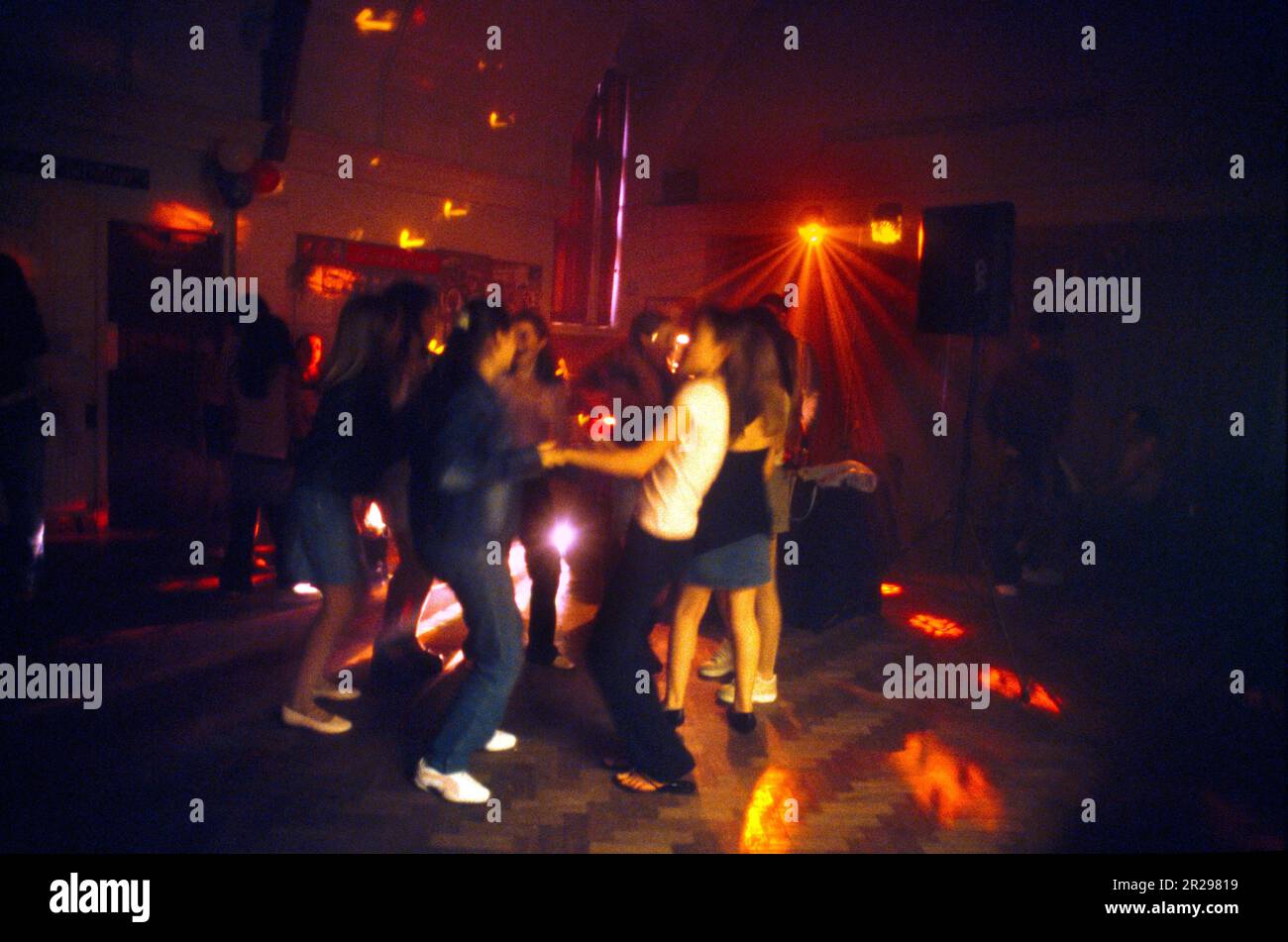 Teenagers Dancing At Disco for 13th Birthday Party Surrey England Stock