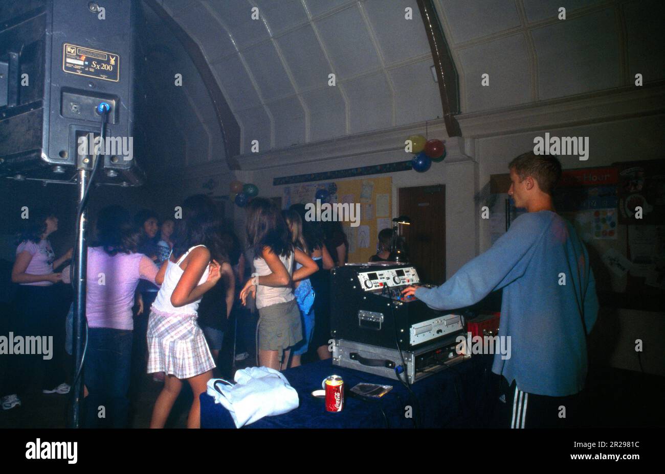 Teenagers Dancing At Disco for 13th Birthday Party Surrey England Stock