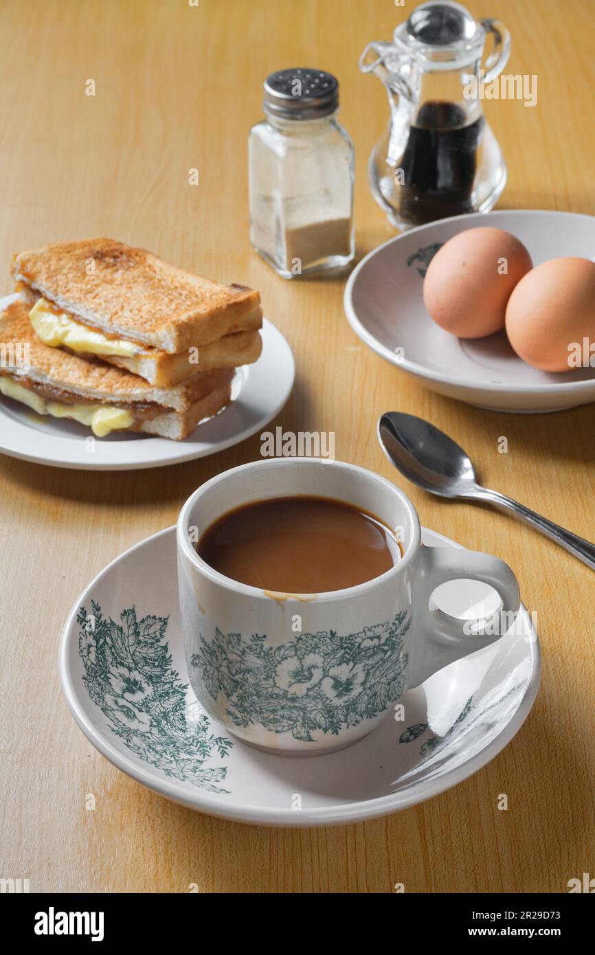 Traditional oriental and vintage kopitiam breakfast style. Popular in Malaysian and Singaporean. Stock Photo