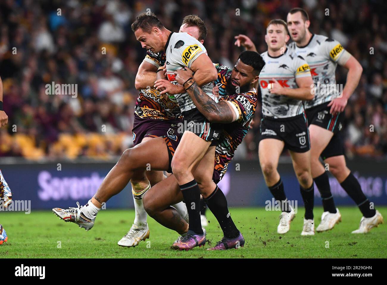 Scott Sorensen of the Panthers is tackled during the NRL Round 12 match  between the Brisbane Broncos and the Penrith Panthers at Suncorp Stadium in  Brisbane, Thursday, May 18, 2023. (AAP Image/Jono