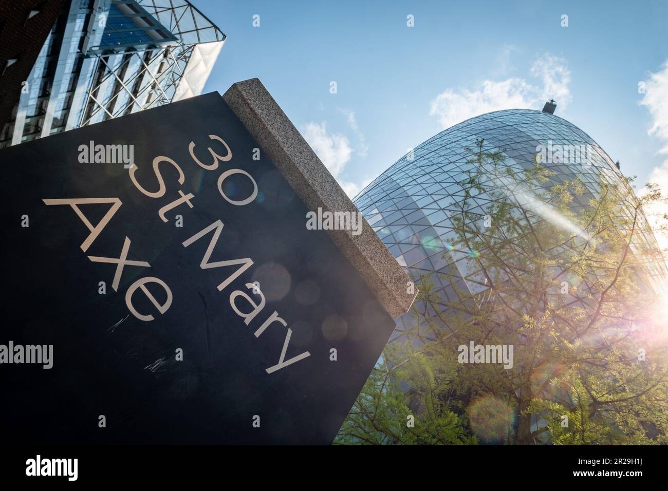 London- May 2023: 30 St Mary Axe aka Gherkin building in the city of London Stock Photo