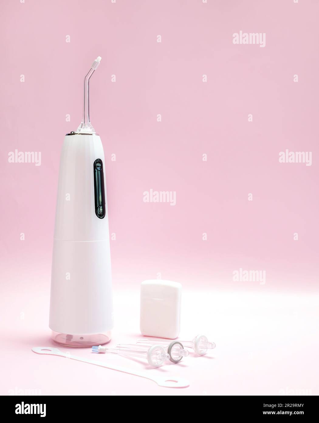 Oral hygiene set. Oral teeth irrigator, nozzles, dental floss, tongue