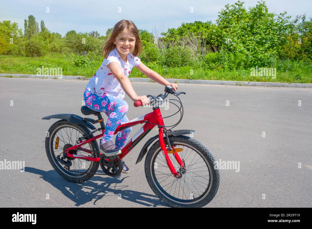 Happy Little Boy Riding a Bike Stock Image - Image of lifestyle