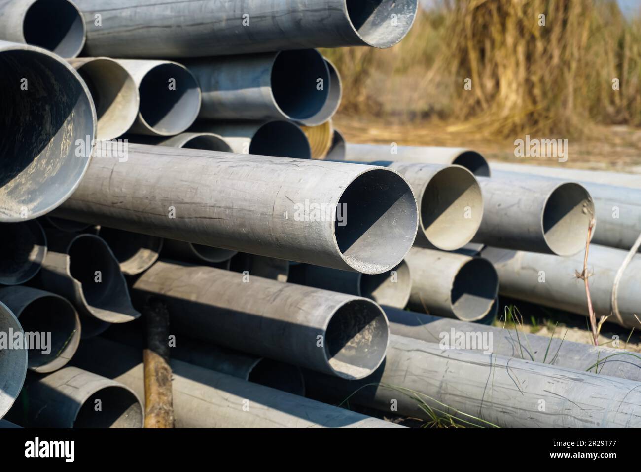Dirty plastic pipes. construction waste plastic. Background of big