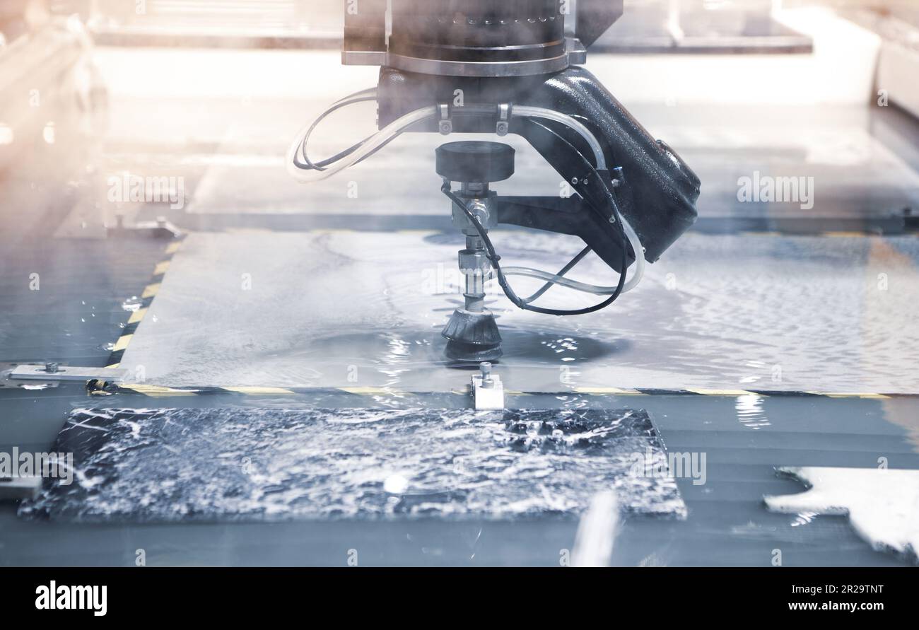 Modern CNC Abrasive water jet cutting machine using high pressure water