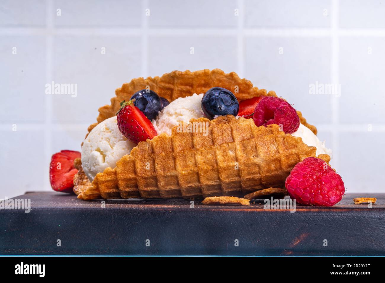 Various sweet taco ice creams. Waffle taco shells with chocolate and ...