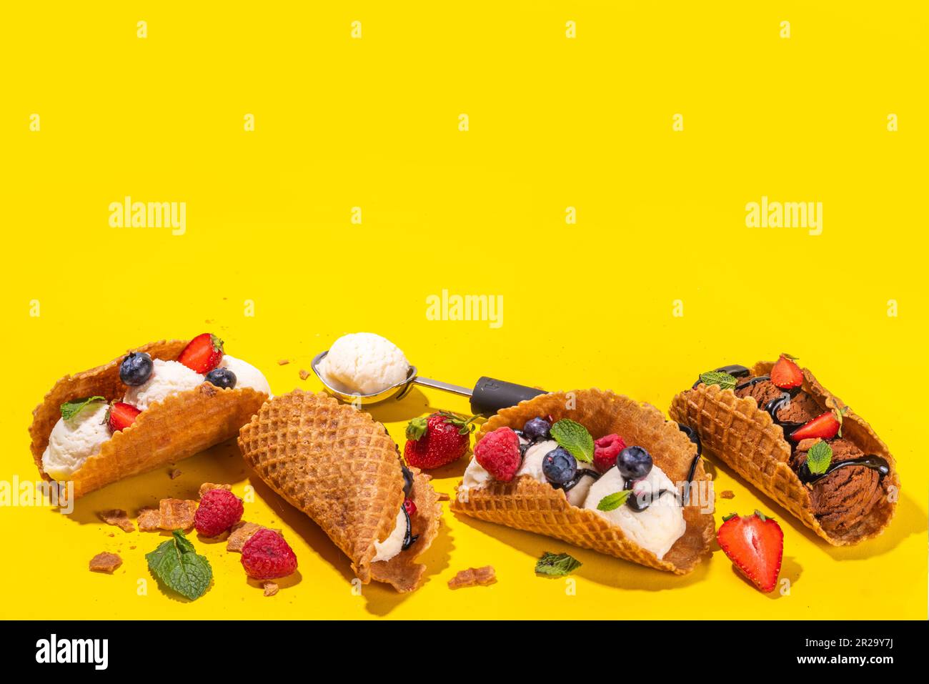 Various sweet taco ice creams. Waffle taco shells with chocolate and vanilla flavour ice cream