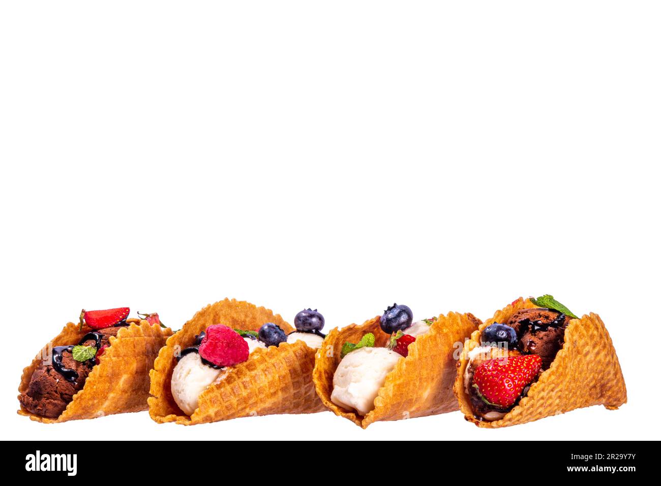 Various sweet taco ice creams. Waffle taco shells with chocolate and vanilla flavour ice cream