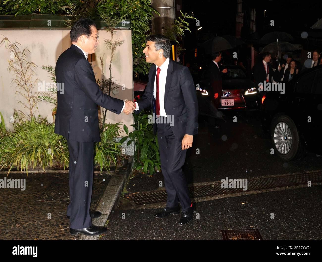 Japanese Prime Minister Fumio Kishida L Invites British Prime 