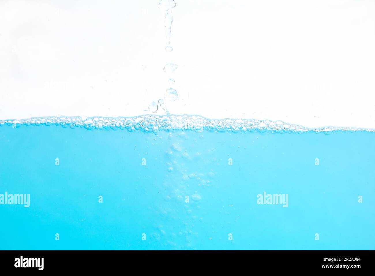 Water Surface Splash and bubbles . on white background Stock Photo - Alamy