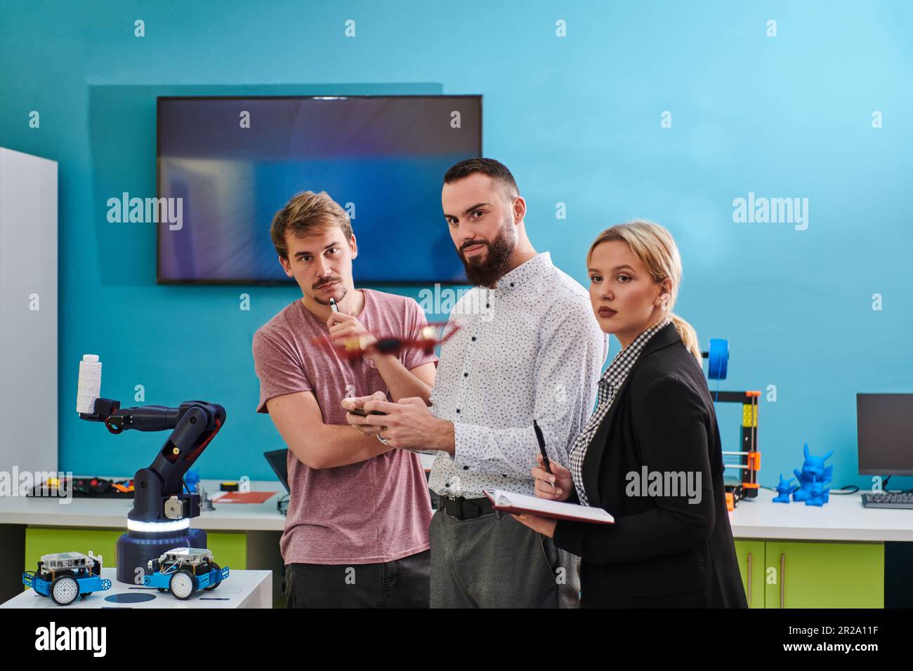 A group of students working together in a laboratory, dedicated to ...