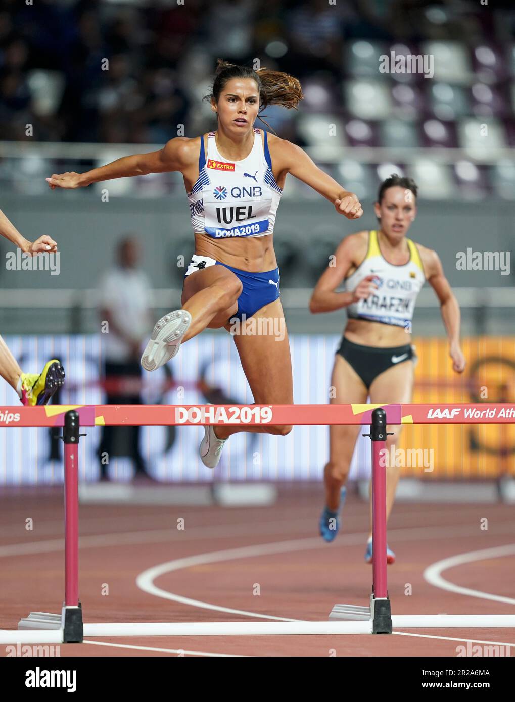 Amalie Iuel running the 400m hurdles at the 2019 World Athletics