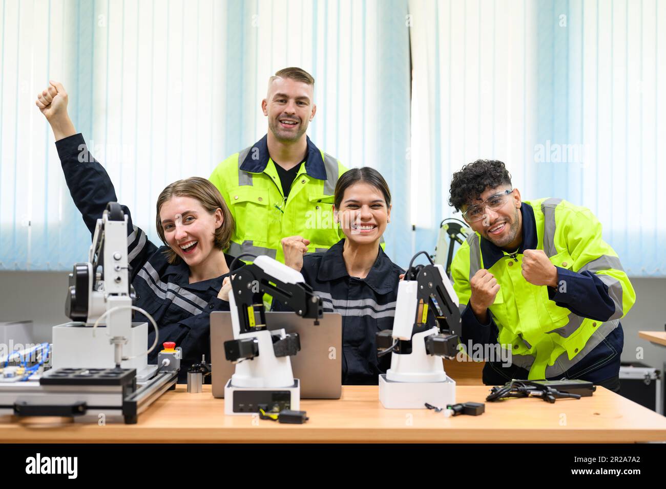 Group of maintenance engineers working with robot maintenance Stock ...