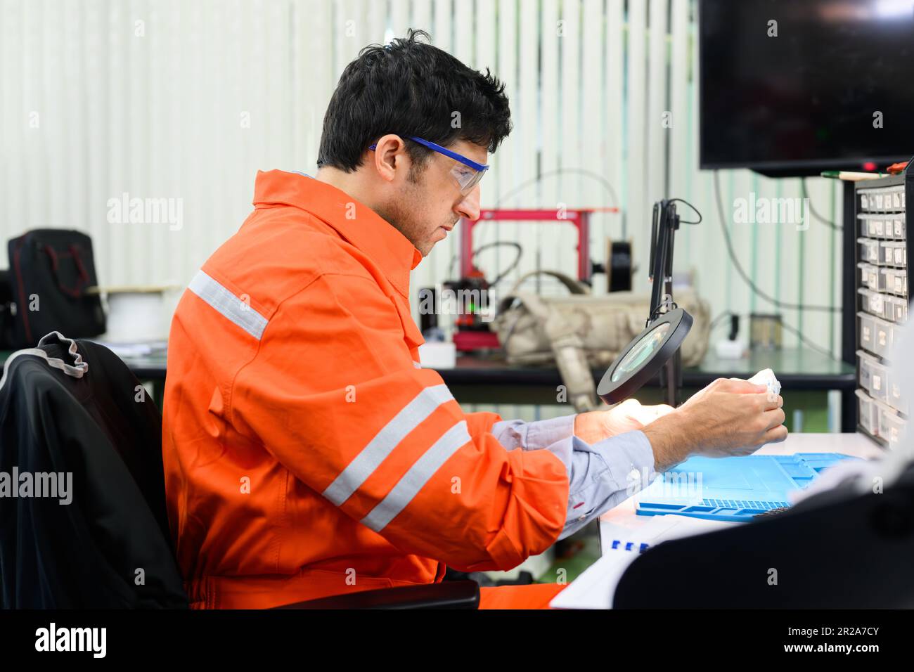 Maintenance engineer working and solving problems on machine Stock Photo