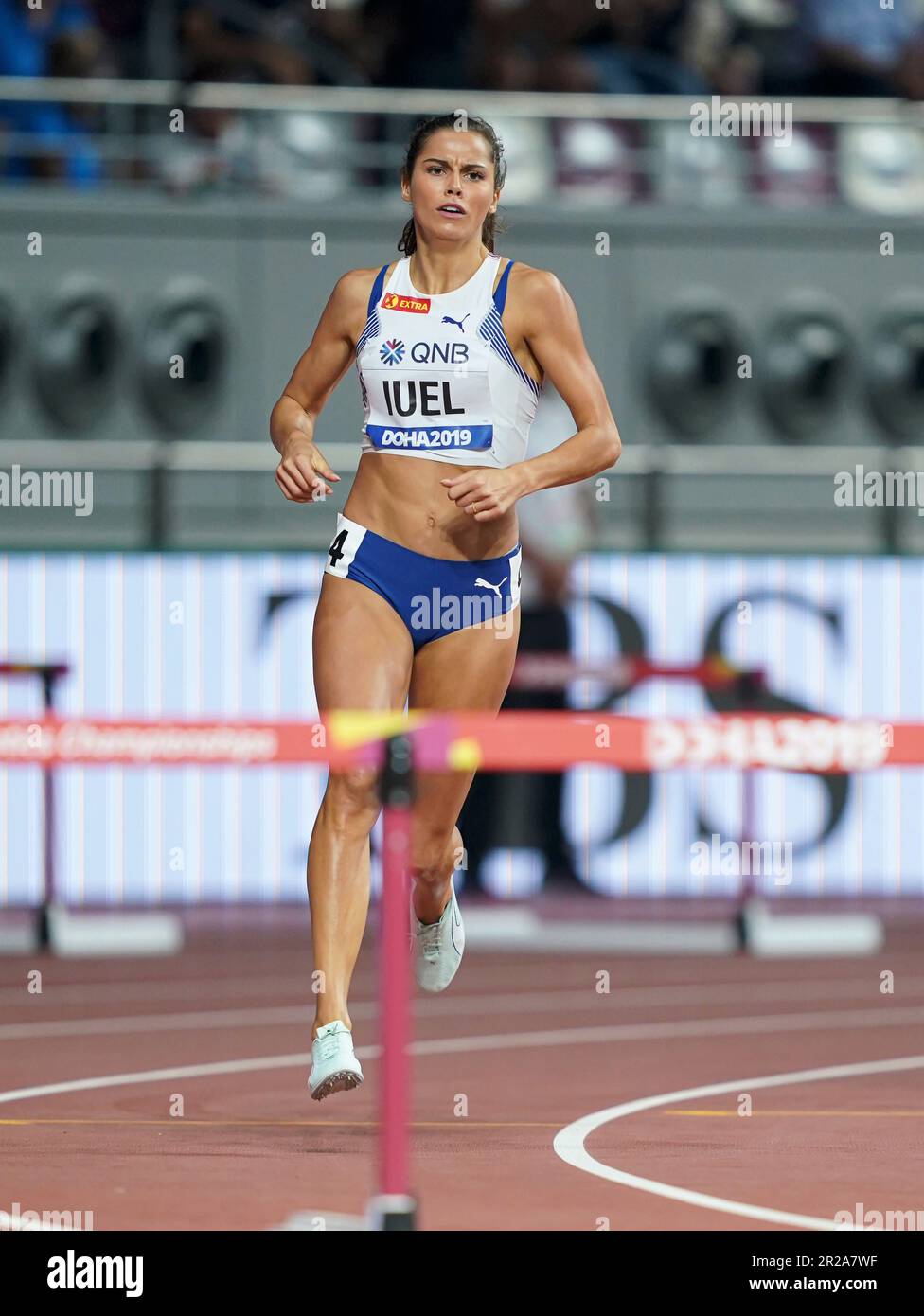 Amalie Iuel running the 400m hurdles at the 2019 World Athletics