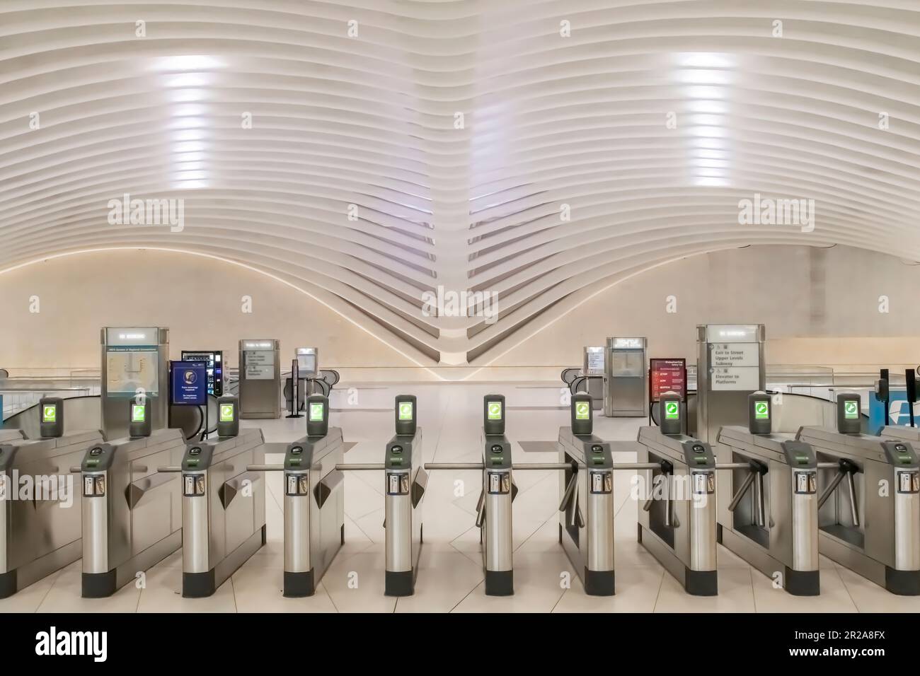 New York City, NY, USAAugust 2022; Interior view of PATH station train platform with turnstiles