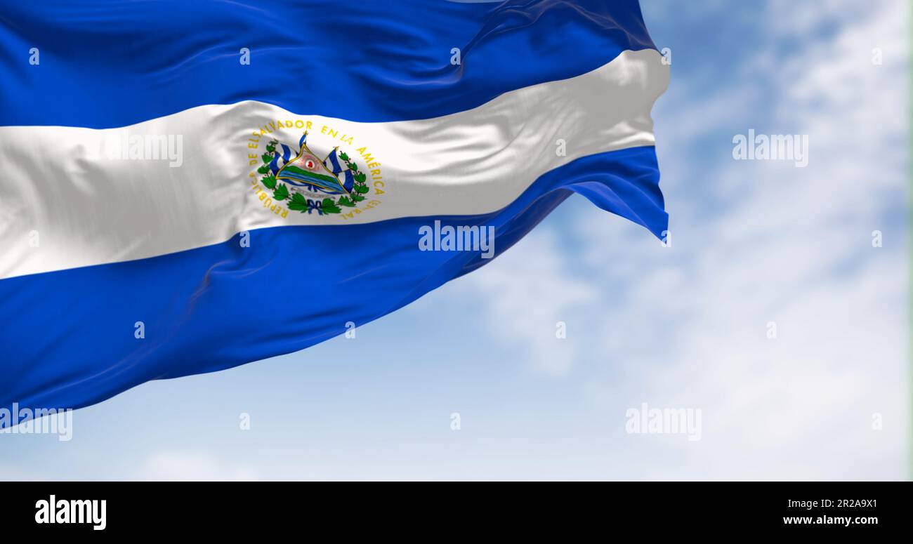 El Salvador national flag waving in the wind on a clear day. Three