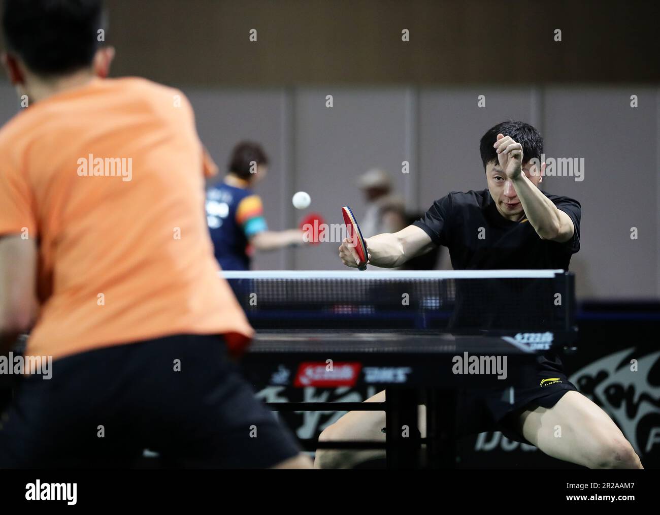 Durban, South Africa. 18th May, 2023. Ma Long (R) of China attends a