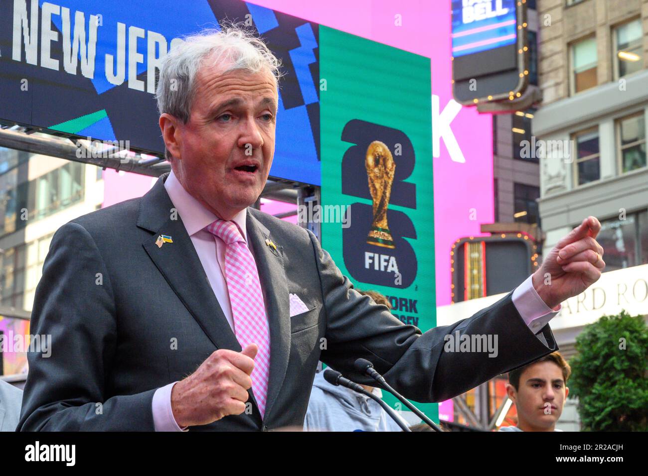 New York, USA. 18th May, 2023. New Jersey Governor Phil Murphy wears lapel pins with US and Ukrainian flags at a FIFA World Cup 2026 New York/New Jersey Launch Event in Times Square. The event unveiled the official themes for the MetLife stadium matches: 'We are NYNJ' and 'We are 26'. The world's top soccer competition is already planning to host 8 matches in the New York/New Jersey area and the local organizers want to host the final game here too. Credit: Enrique Shore/Alamy Live News Stock Photo