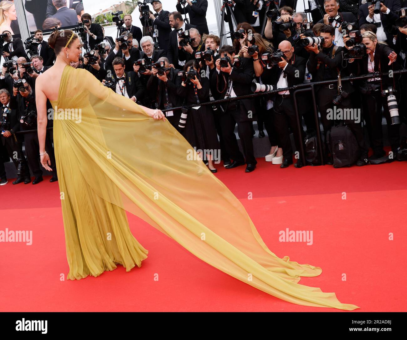 Karlie Kloss poses for photographers upon arrival at the premiere of