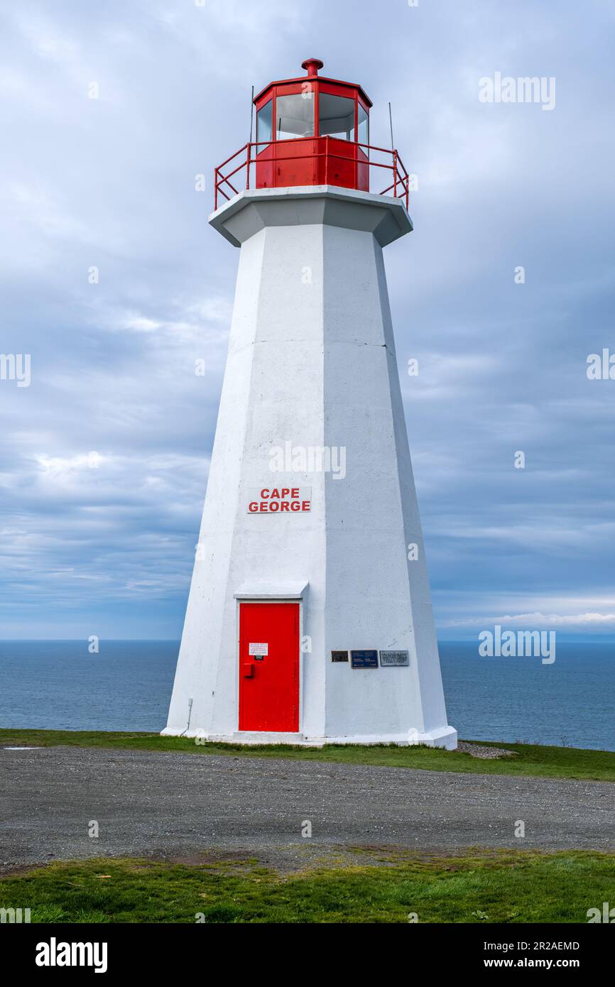 The Cape George Point Lighthouse sits atop a high cliff overlooking the waters of St Georges Bay in Antigonish County Nova Scotia.  It is an excellent Stock Photo