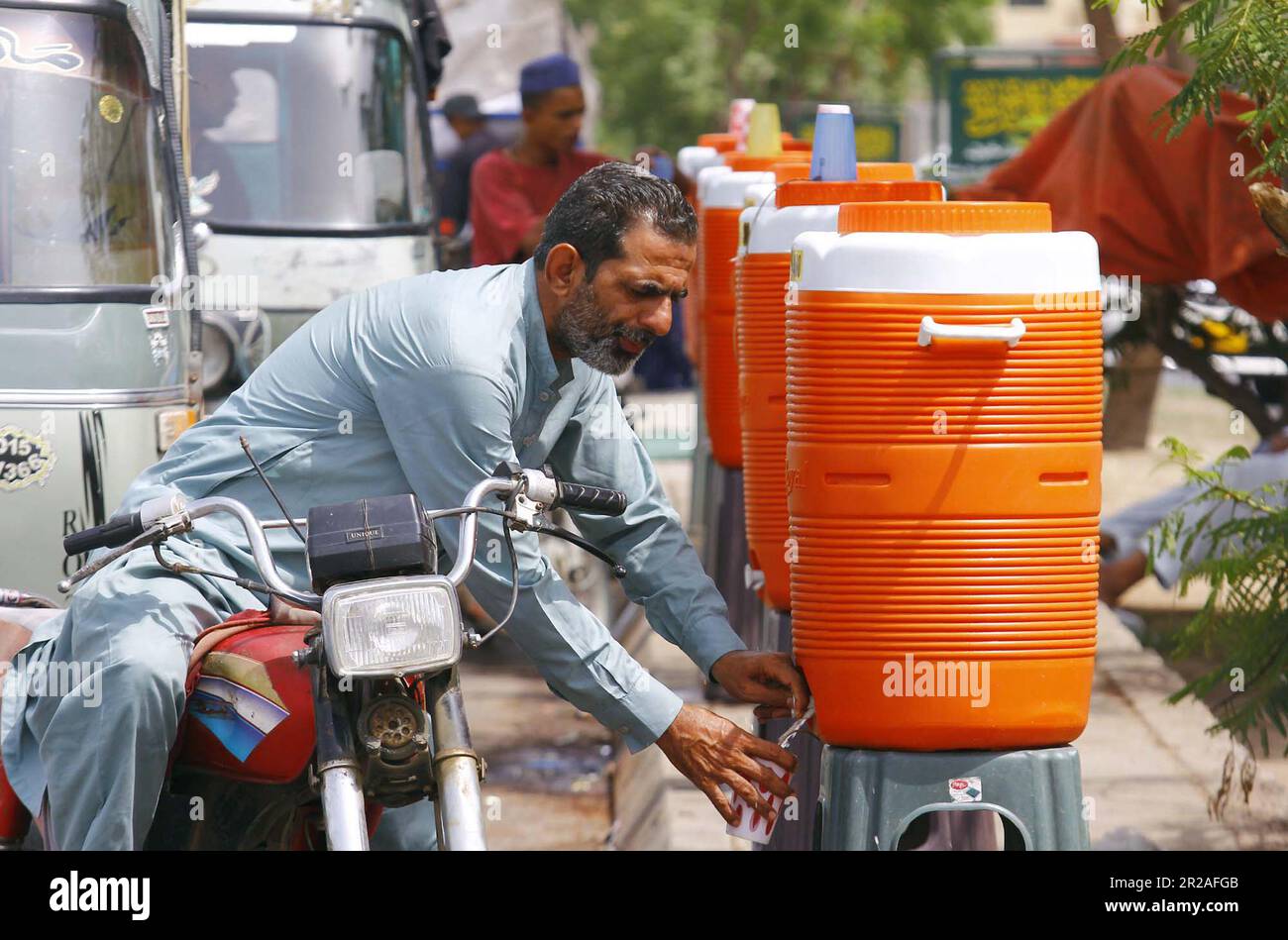 Pakistan Rashid Water Hyderabad, Pakistan, May 18, 2023. Citizens are quenching their thirst ...