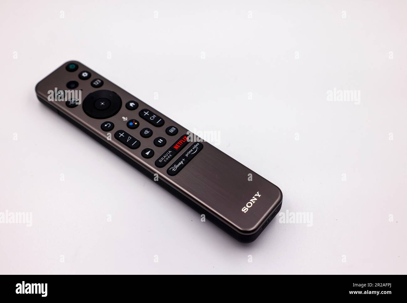 Sony remote control device for TV television isolated on white background. Keypad has direct