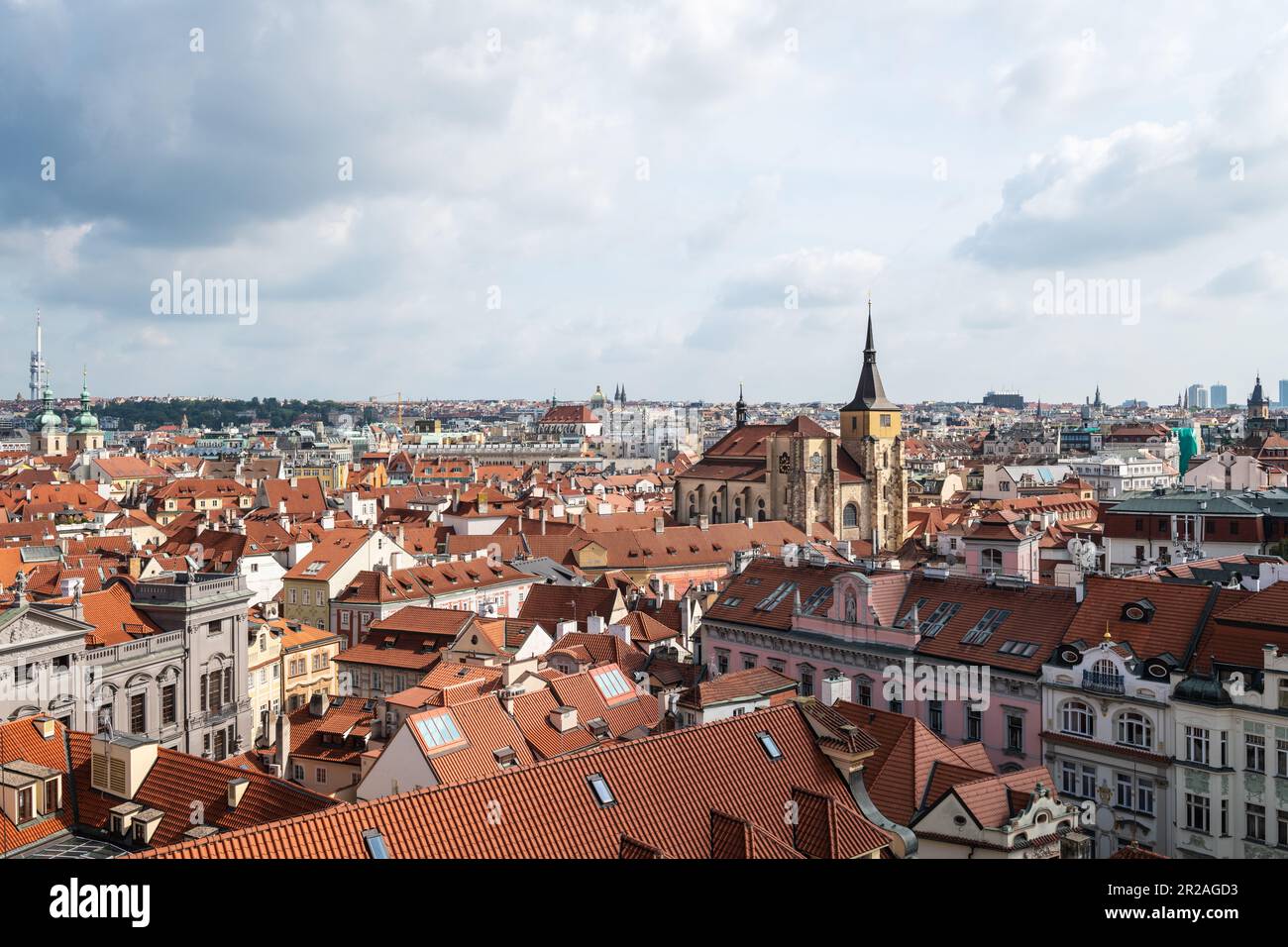 Aerial panoramic view of Prague against a cloudy sky. Stock Photo